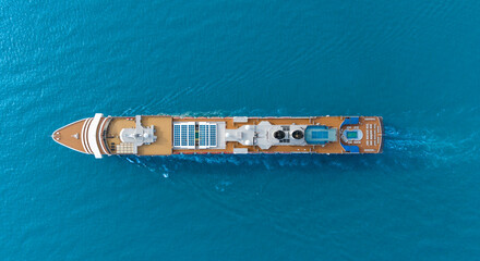 Aerial view of beautiful white cruise ship above luxury cruise in the ocean sea at early in the morning time concept smart tourism travel on holiday take a vacation time on summer
