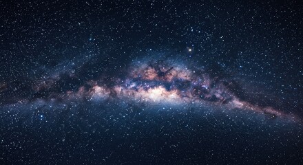 Obraz premium Galactic Tapestry: The Milky Way unfolds in a celestial panorama, a breathtaking view of countless stars, cosmic dust, and vibrant nebulae, evoking a sense of wonder and the vastness of the cosmos.