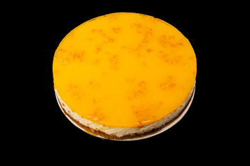 Orange cheesecake isolated on a white background.