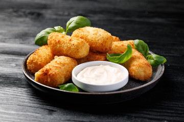 Homemade potato croquettes with mayonnaise. Traditional croquette.