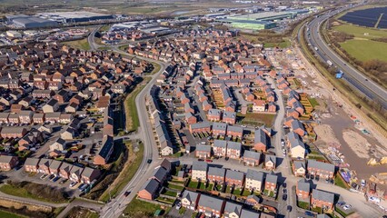 Aerial view of housing foundations being built on a building site and housing estate