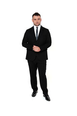 A handsome dark-haired man wearing a business suit, a white shirt on a white background