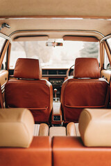 A pristine car interior, showcasing sleek design, clean surfaces, and modern technology, reflecting luxury and attention to detail