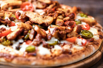 Gyros Pizza with jalapeno pepper and mozzarella cheese. Soft focus. Close up.