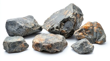 Various Natural Stones Displayed on White Background, Showcasing Different Textures, Colors, and Shapes for Use in Artistic or Educational Projects