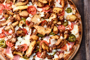 Gyros Pizza with jalapeno pepper and mozzarella cheese. Soft focus. Top view. Close up.