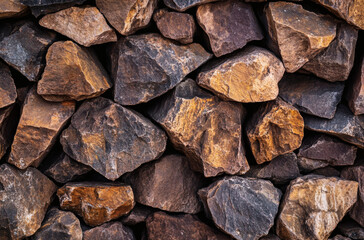 Fototapeta premium stack of firewood. Stone wall surface texture. For design. Wide banner.