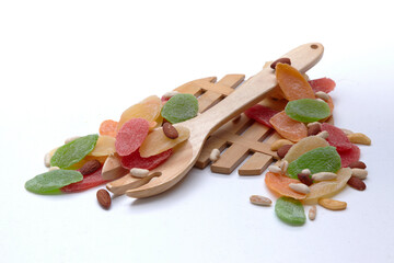 Colorful Dried Fruits and Nuts on Wooden Utensils