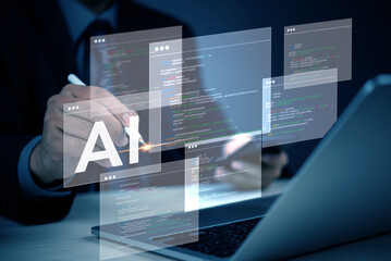 AI artificial intelligence technology and machine learning development programming concept with a businessman innovation writing code data technology on a holographic screen.
