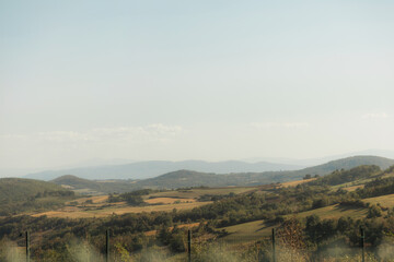 Fototapeta premium The image depicts a charming and well-maintained residential property, likely located in a rural or small-town setting in Europe. 