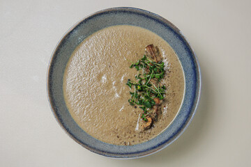 a bowl of creamy mushroom soup. 