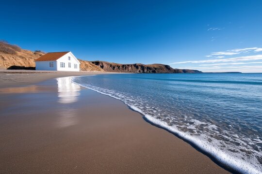 house on the sand beach near sea