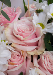 soft pink roses and white daisies bouquet
