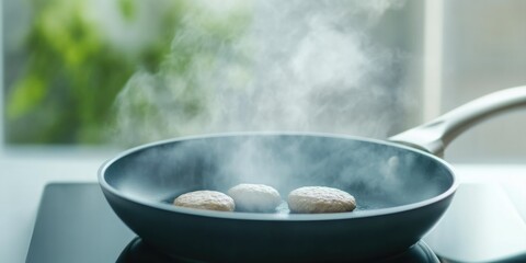 Fresh Beef Patties Cooking in Frying Pan