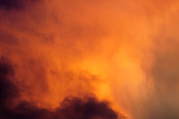 Fiery Sunset Clouds. A colorful sky with clouds. Cloud in the background. Phone or desktop wallpaper.