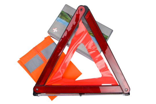 Traffic warning triangle, orange reflective vest and first aid kit box isolated on a white background with clipping path.