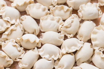 Raw Chinese meat dumplings perfect for steaming