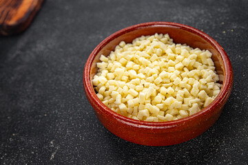 mozzarella cheese for pizza grated cheese fine fresh tasty food dish delicious gourmet food background on the table rustic food top view copy space