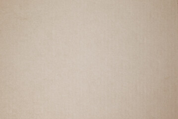 Light beige cardboard texture background, copy space.