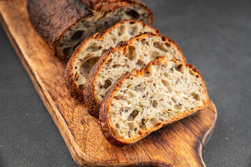 Grain bread sunflower, chia, flax seed, cut oats fresh tasty food dish delicious gourmet food...