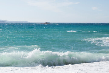 Waves of the Ionian Sea that crash on the rocks and shore