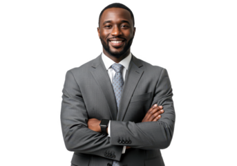 A professional African American businessman stands with his arms crossed and smiles confidently isolated on transparent background