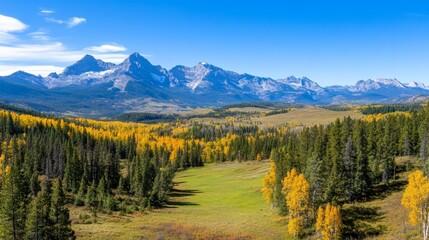 Majestic mountain landscape with vibrant autumn foliage and clear blue sky in serene nature setting