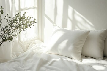 Minimalist design featuring a white cushion on a bed adorned with white linen sheets in a modern bedroom with natural light filtering through the window, creating a serene atmosphere