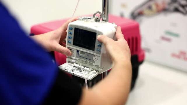 A close-up shot of a modern infusion pump, a critical medical device 