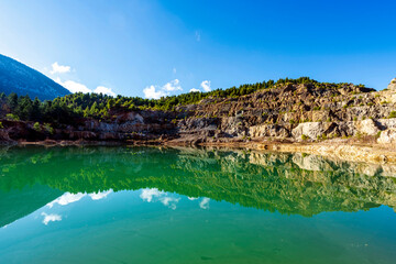 Crystal Clear Reflection on Quarry Lake in Evia