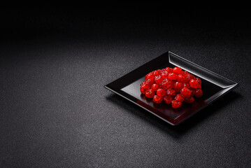 Dried sweet red pitted cherries or candied fruits