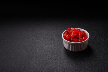 Dried sweet red pitted cherries or candied fruits