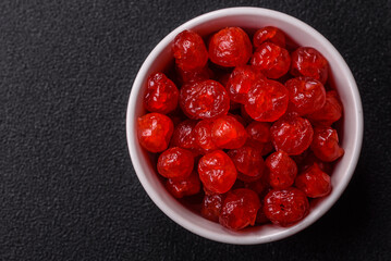 Dried sweet red pitted cherries or candied fruits