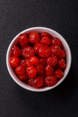 Dried sweet red pitted cherries or candied fruits