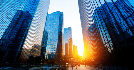 Obraz premium Modern Skyscrapers at Sunrise in a Cityscape 