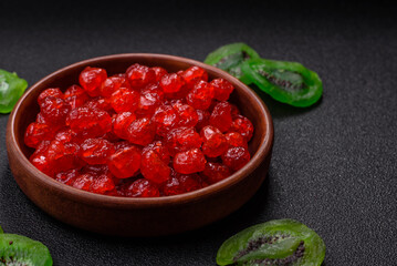 Dried sweet red pitted cherries or candied fruits