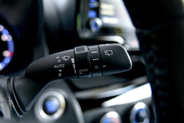 Switch to activate wiper in passenger car