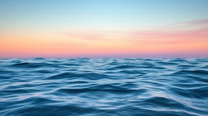 Obraz premium Calm ocean water and colorful sky during a beautiful sunset