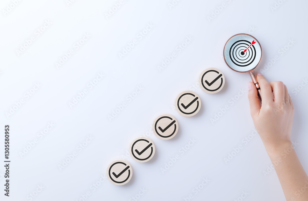 Poster business strategy planning and quality management concept. magnifying glass focuses on target icon a