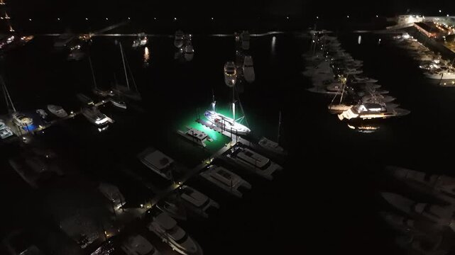 Cinematic aerial view from a drone at night on the Amador Causeway in Panama City, 4K Video