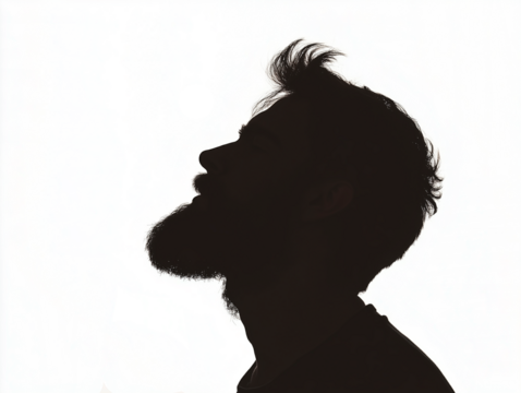 Silueta de hombre con barba en tonos blancos y negros sobre fondo transparente