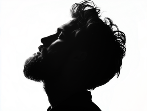 Silueta de hombre con barba en tonos blancos y negros sobre fondo transparente