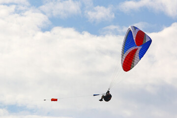 Paraglider being towed by a winch	