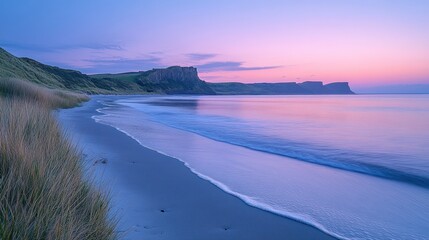 Fototapeta premium Coastal sunrise, calm waves, sandy beach, cliffs, serene landscape, travel destination