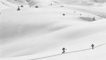 Aerial view of ski touring man woman with snow