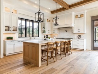 A spacious and modern kitchen with an island and cabinets