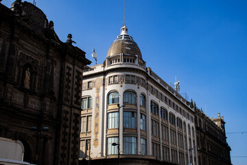 Obraz premium Beautiful architecture of the historical buildings at Mexico City downtown. November twentieth street.