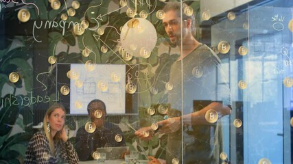 In office, diverse team discussing strategies with Bitcoin symbols animation overlay - Powered by Adobe