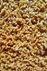 Delicious Yellow Rice Spread Across a Wooden Surface, Inviting Culinary Creativity and Flavor