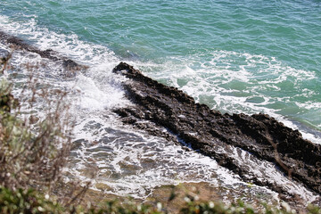 Fototapeta premium Rocky coast next to the sea.